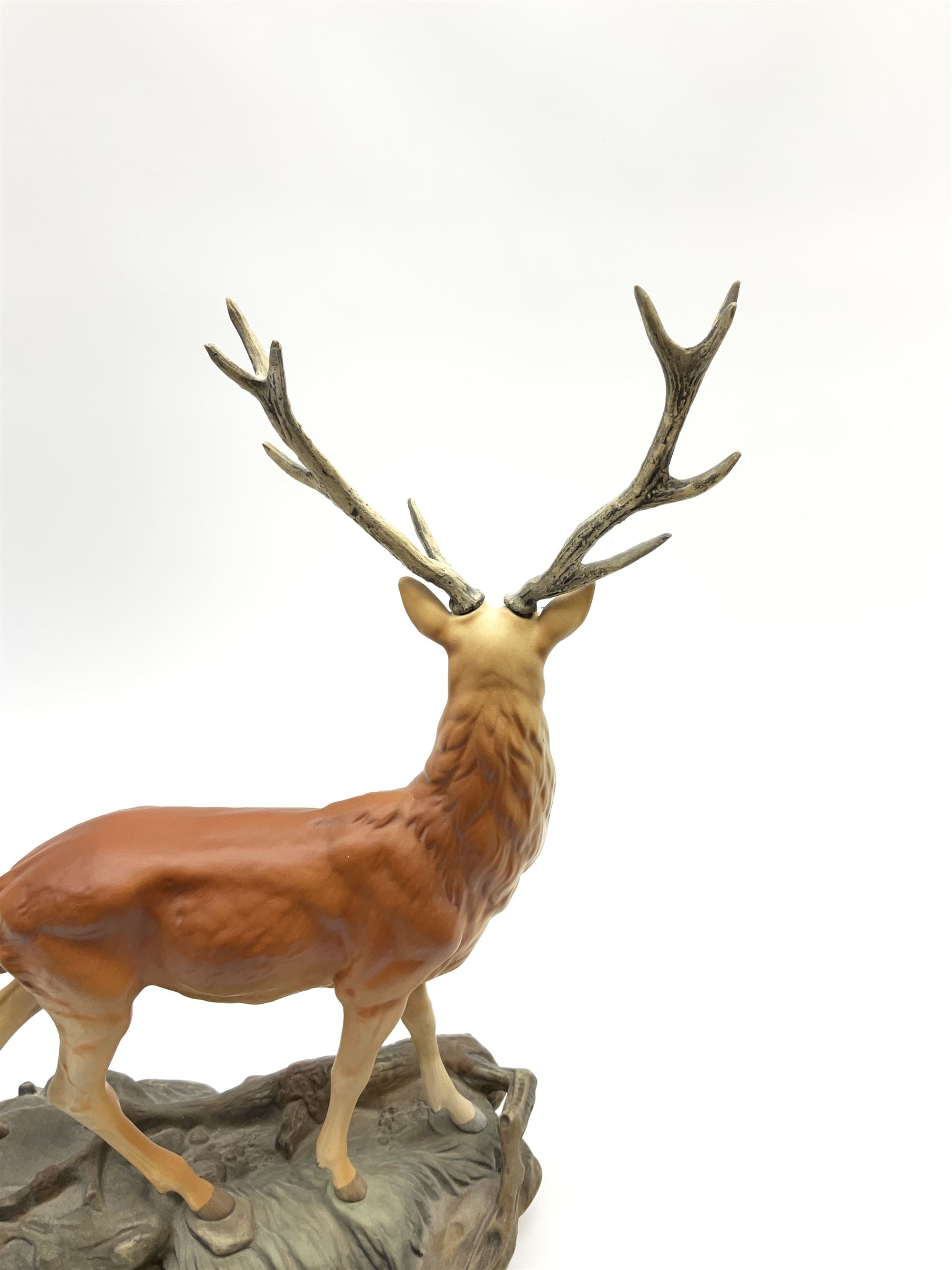 A Beswick Connoisseur matt model of a Stag upon a rocky modelled base, 2629