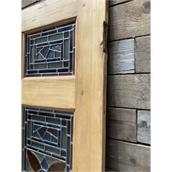 Early 20th century pine six panel door with later stained glass panels