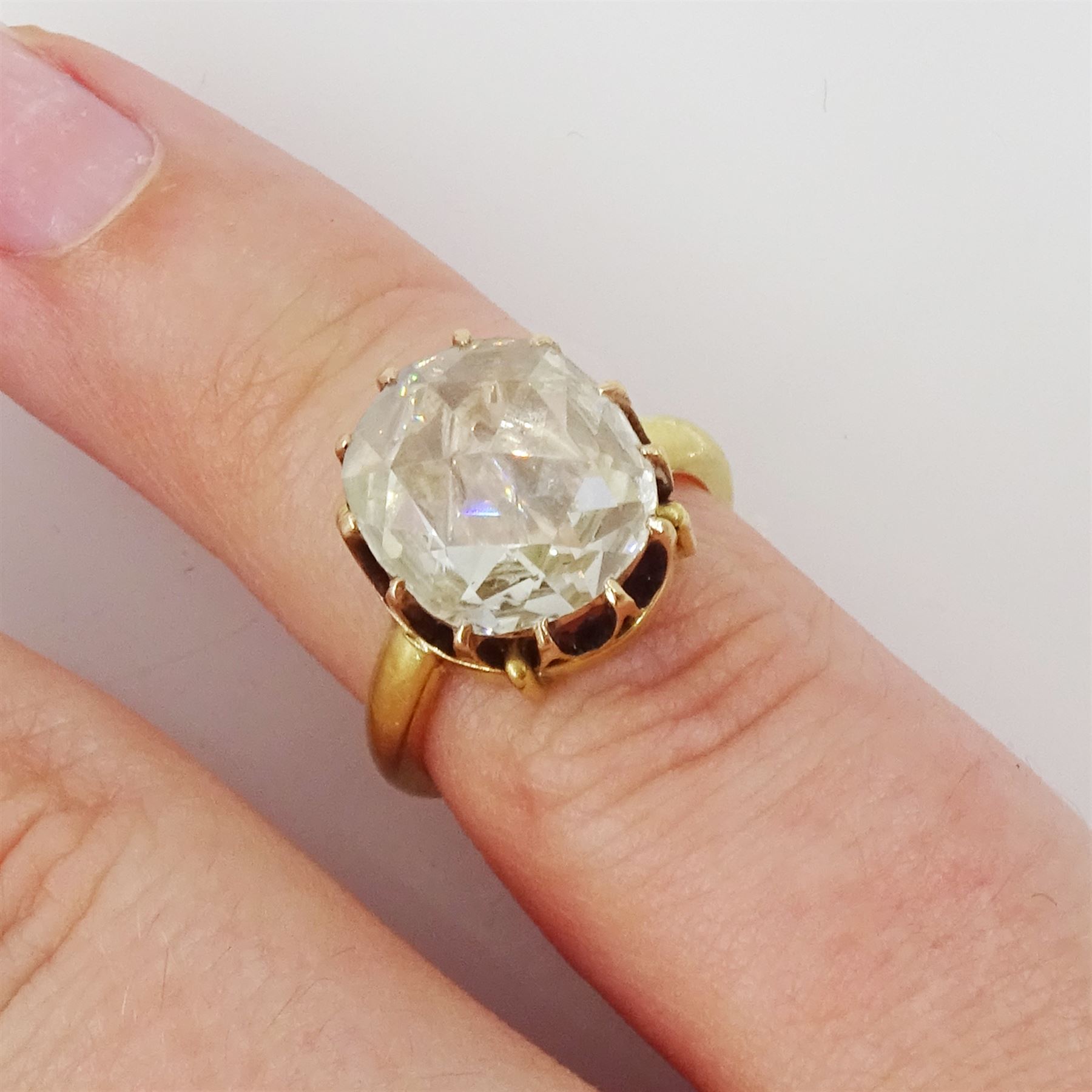 19th century 15ct gold single stone diamond ring, the backed oval rose cut diamond measuring approx 11.13mm x 9.69mm, in a twelve claw setting, in an 18ct gold shank