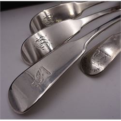 Four Scottish silver Fiddle pattern toddy ladles, comprising a pair of George IV examples, each engraved with monogram, hallmarked William Constable, Edinburgh 1833, together with a George III example, engraved with crest, hallmarked James McKay, Edinburgh 1810 and a Victorian example, with engraved owl crest, hallmarked John Murray or John Muir, Glasgow 1851