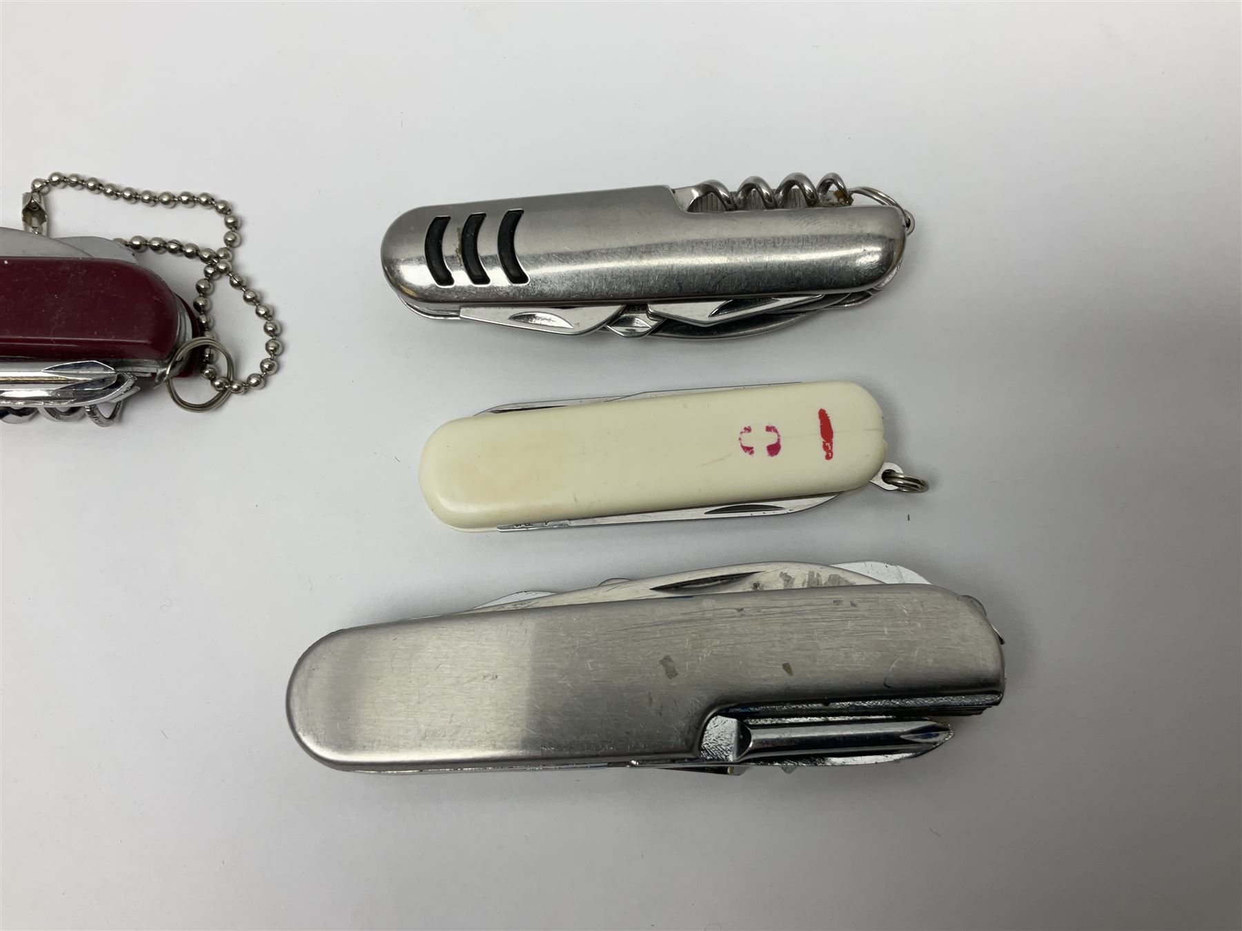 Fifteen folding/pocket knives including Swiss Army type knives with various number of blades, British army jack knife by J.H. Thompson Sheffield dated 1955 with broad arrow, promotional etc (15)