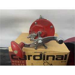 Collection of fishing memorabillia and equipment, including an Allcocks three piece split cane trout fly rod, Shakespeare Salt 3600 surf rod, two tackle bags, Old Red Seastreak multiplier reel, Sportext Saltwater fixed spool reel, fishing dvds, etc