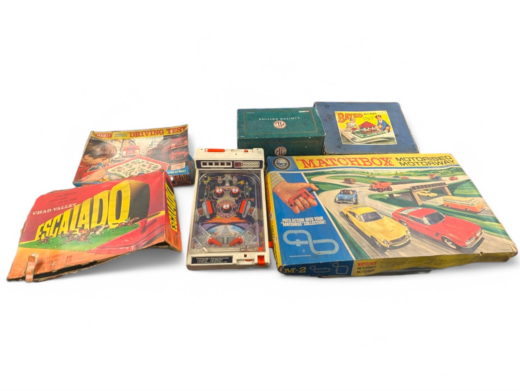Collection of vintage toys and games, including Chad Valley Escalado, Corgi 1:18 scale MG diecast model, Bayko Building Set, Matchbox Motorised Motorway, etc