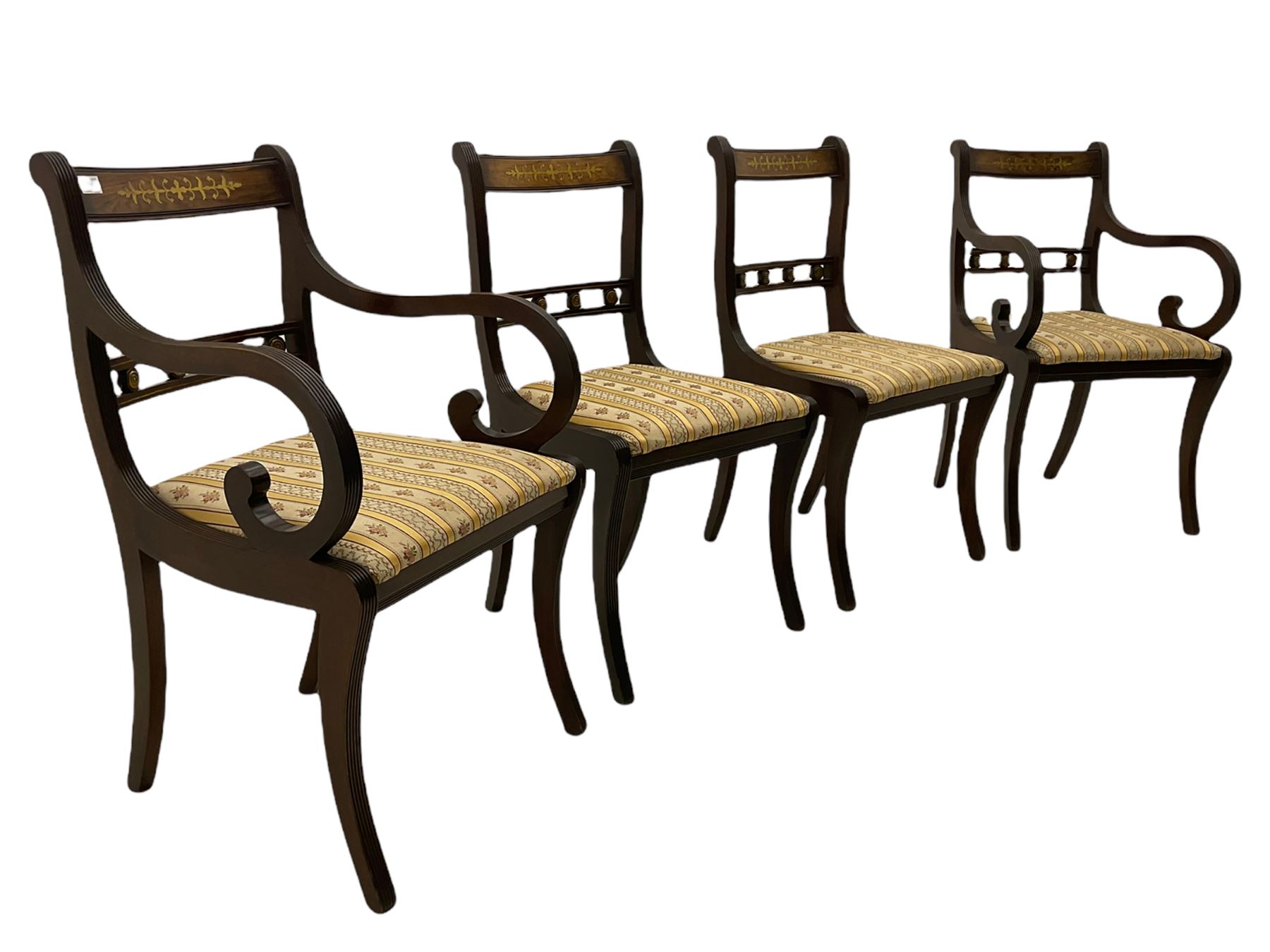 Set of eight Regency style mahogany dining chairs, brass inlay with gilded detail