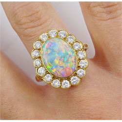 18ct gold oval opal and diamond cluster ring, hallmarked, opal approx 13.5mm x 10mm, total diamond weight approx 1.00 carat