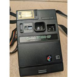 Canon T90 camera and a Kodak EK 160-EF camera