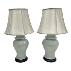 Pair of table lamps of baluster form, with a crackle glaze over a pale blue ground, including shade H68cm