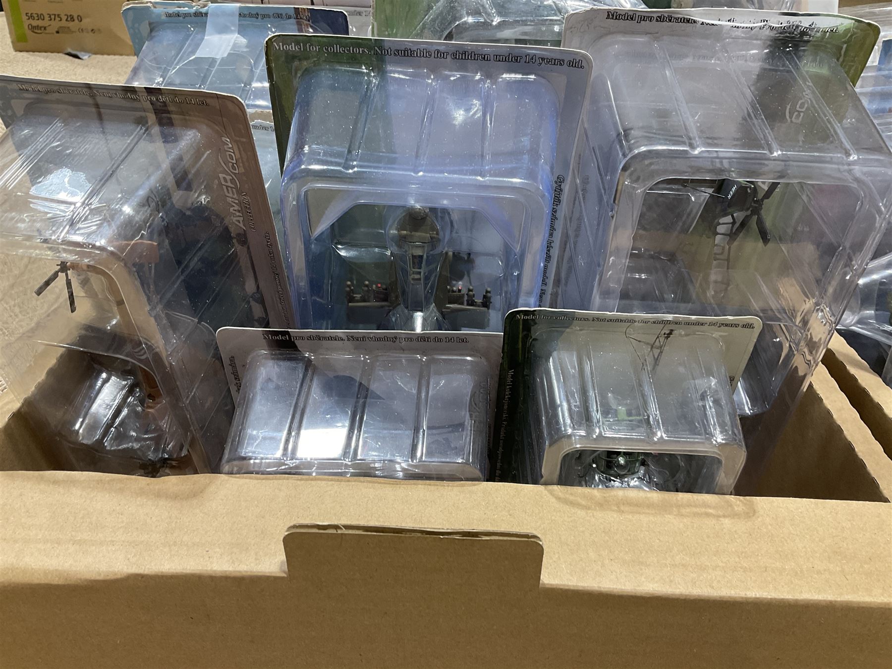 Thirty-six Amer Czechoslovakia periodical issued metal models of helicopters in original packaging; with thirty-nine issues of 'Helicopter Magazine' in two original binders; together with eight Corgi Collection die-cast military models; all boxed; and two others with small display rack; in three boxes