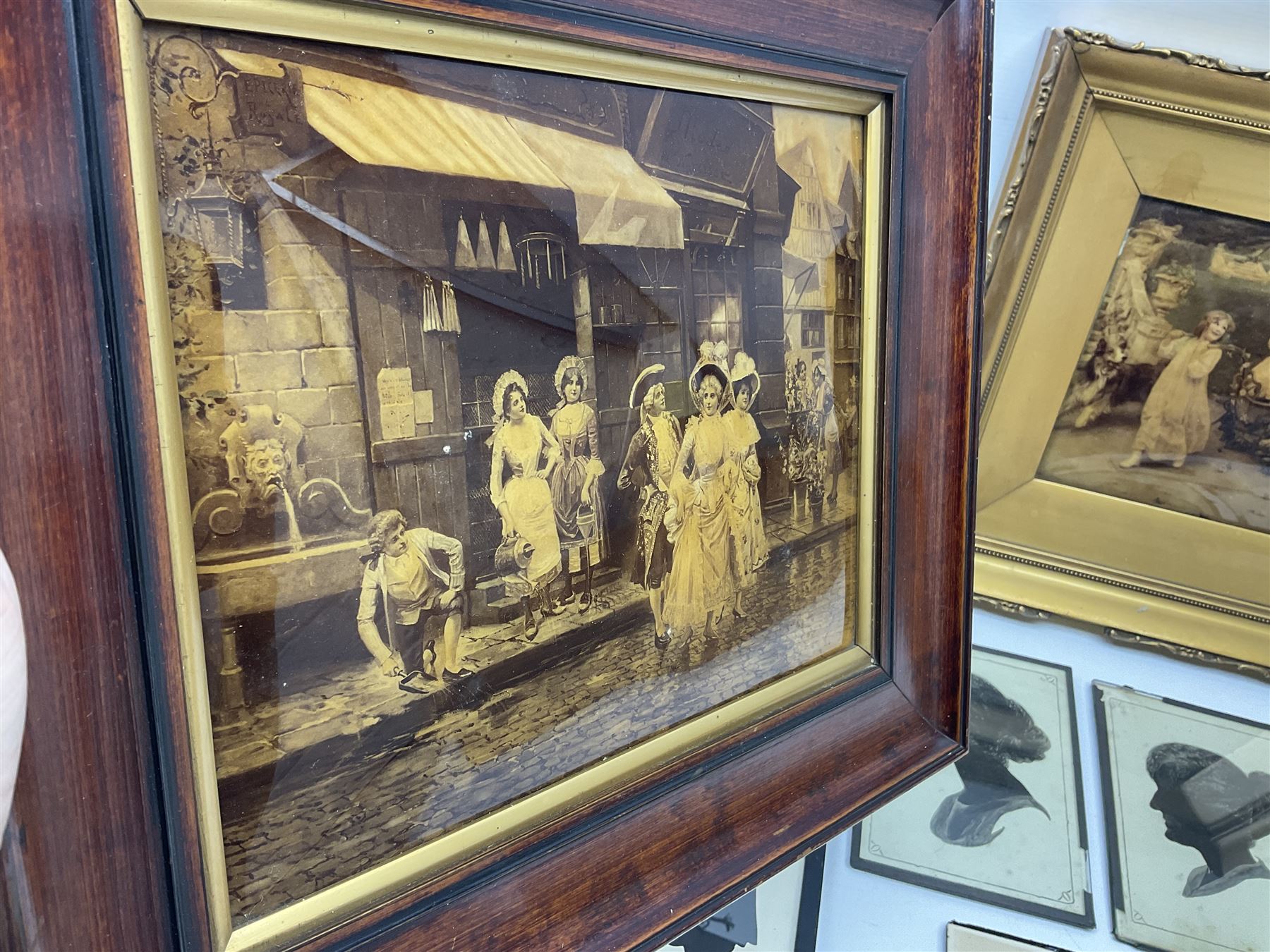 Three early 20th century full profile framed silhouettes, each signed Scot-Ford 1929, together with four hand painted portrait silhouettes and two framed crystoleums, depicting figural scenes (9), largest H35cm