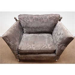  Knole drop side snuggler armchair, upholstered in a purple and grey fabric, W132cm   