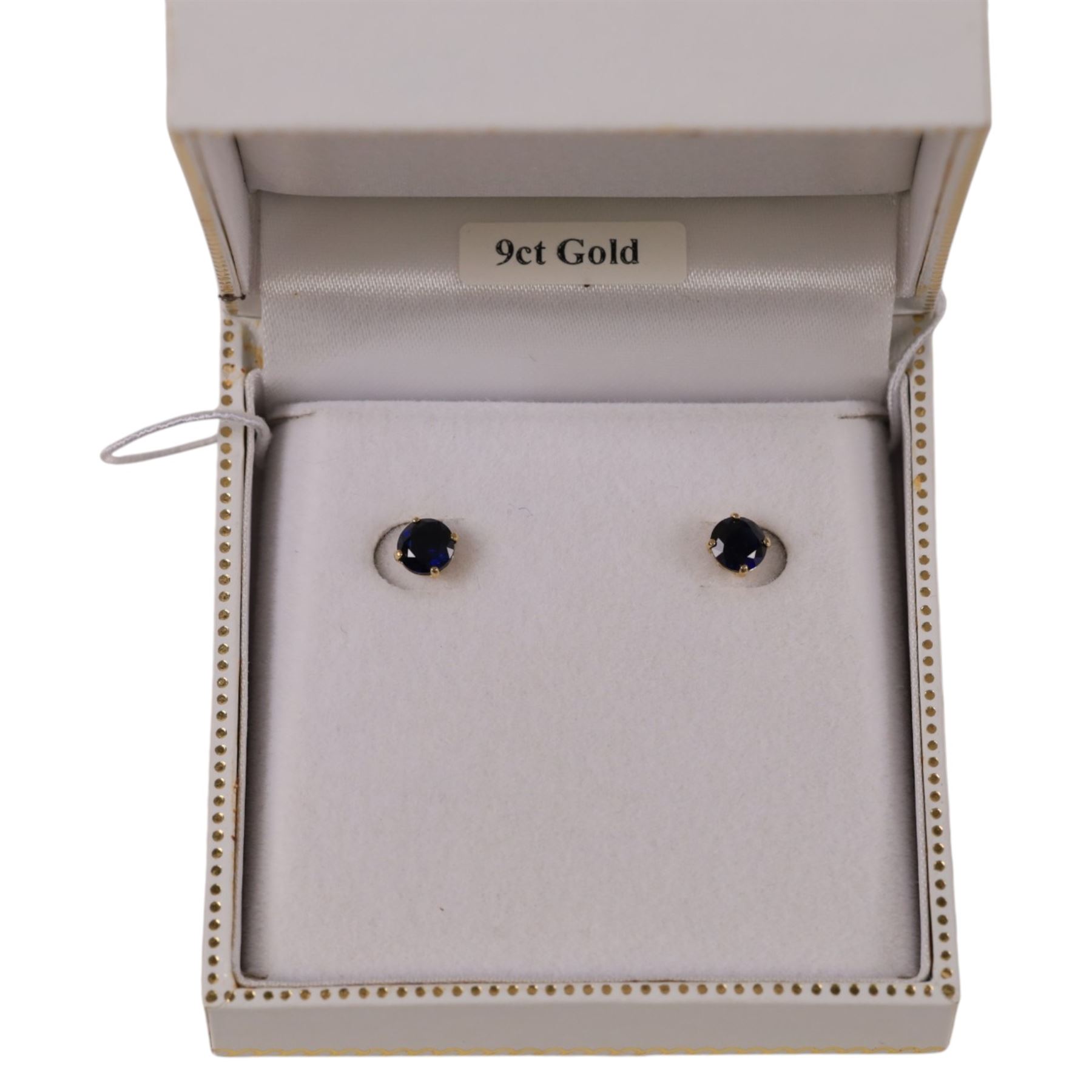 Pair of 9ct gold blue stone stud earrings, boxed