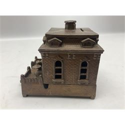 Late 19th century mechanical cast-iron money bank as a dog on a turntable revolving in and out of a  building c1882 by Judd Manufacturing Company L13.5cm