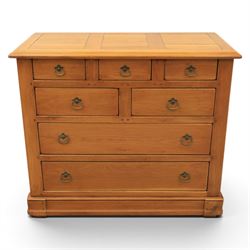 Solid oak chest, fitted with an arrangement of five short and two long drawers