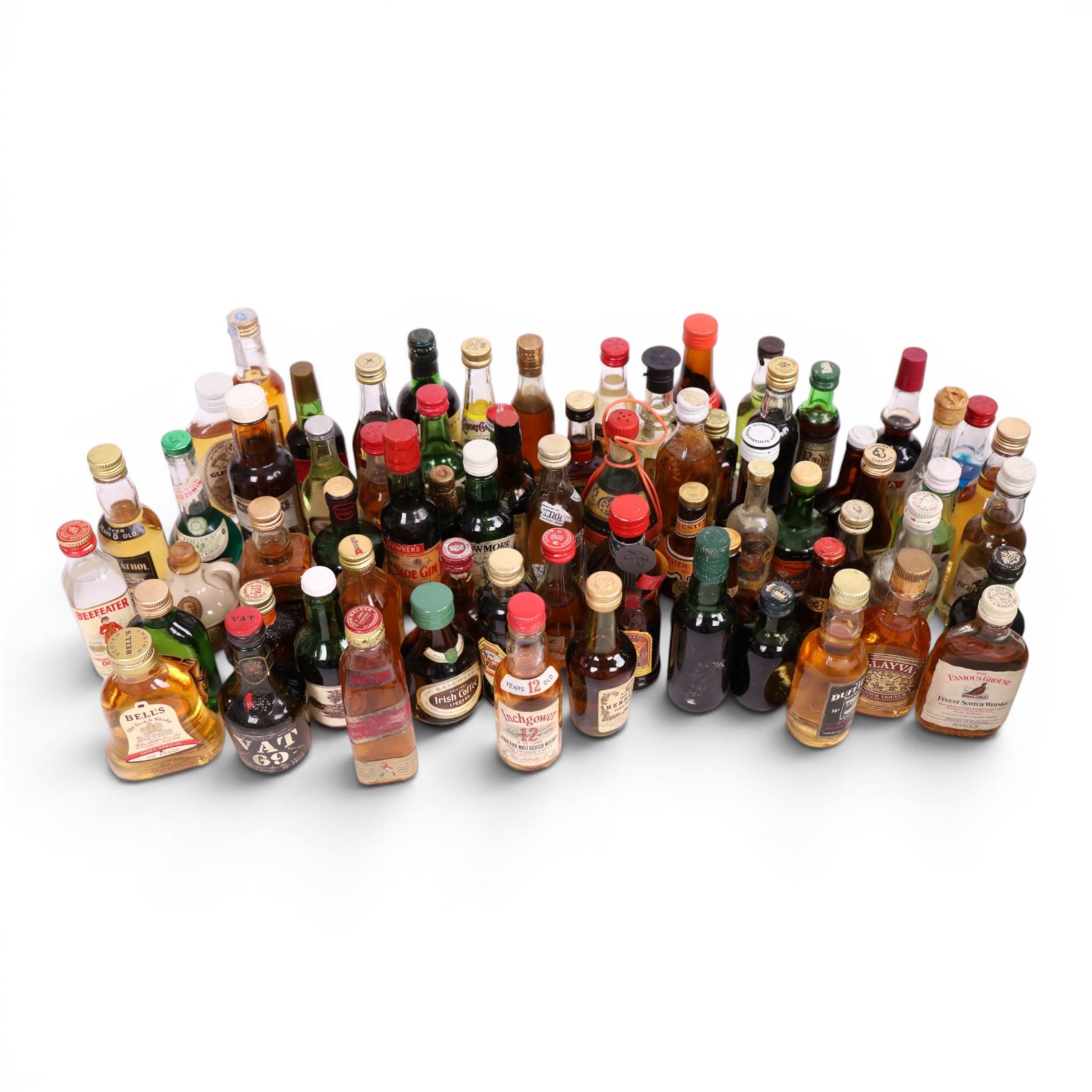 Collection of miniature alcohol, including Bowmore single malt whisky, Dimple whisky, Glen Grant 10 year old whisky, Southern comfort, etc 