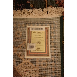  Persian style green ground rug, 235cm x 160cm  