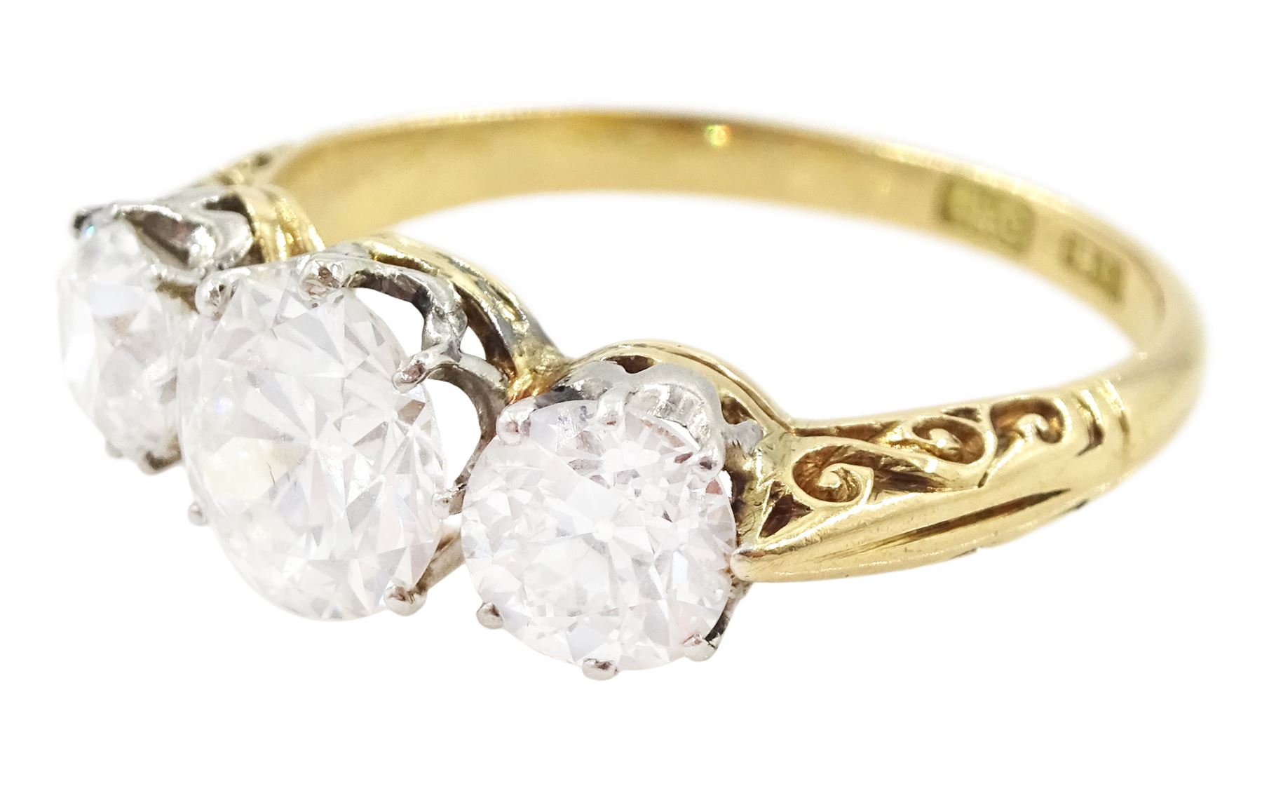 Early 20th century gold three stone old cut diamond ring, stamped 18ct, principal diamond approx 1.15 carat, total diamond weight approx 2.20 carat