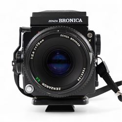 Zenza Bronica ETRS medium format camera, serial no. 8301079, with Zenza Bronica Zenzanon EII 1:2.8 f=75mm lens with lens cap, serial no. 7955198 and two film backs and instruction booklet