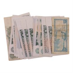 Approximately thirty-two Queen Elizabeth II one pound notes, and an Isle of Man fifty pence note