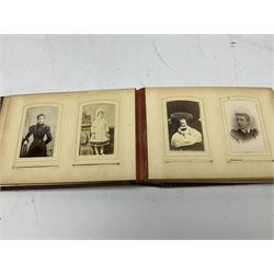 Victorian leather bound musical photo album, together with another victorian photo album, with photographs 