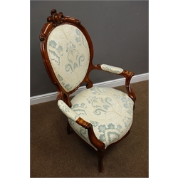  Victorian style walnut framed open armchair, cameo back with carved cresting rail, scroll carved arm supports, cabriole legs, upholstered in patterned fabric, W67cm  