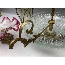 20th century moulded glass and gilt centre piece bowl with carrying handle and ornate trefoil base, together with frilled cranberry edge glass comport with ornate gilt base, and further centre piece with  large glass handle of twisted form, tallest H54cm