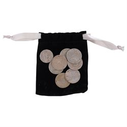 German silver beaker (800 standard), silver plated trophy cup, silver pocket watch, gold plated screw back pocket watch, five silver shilling coins, and some further coins