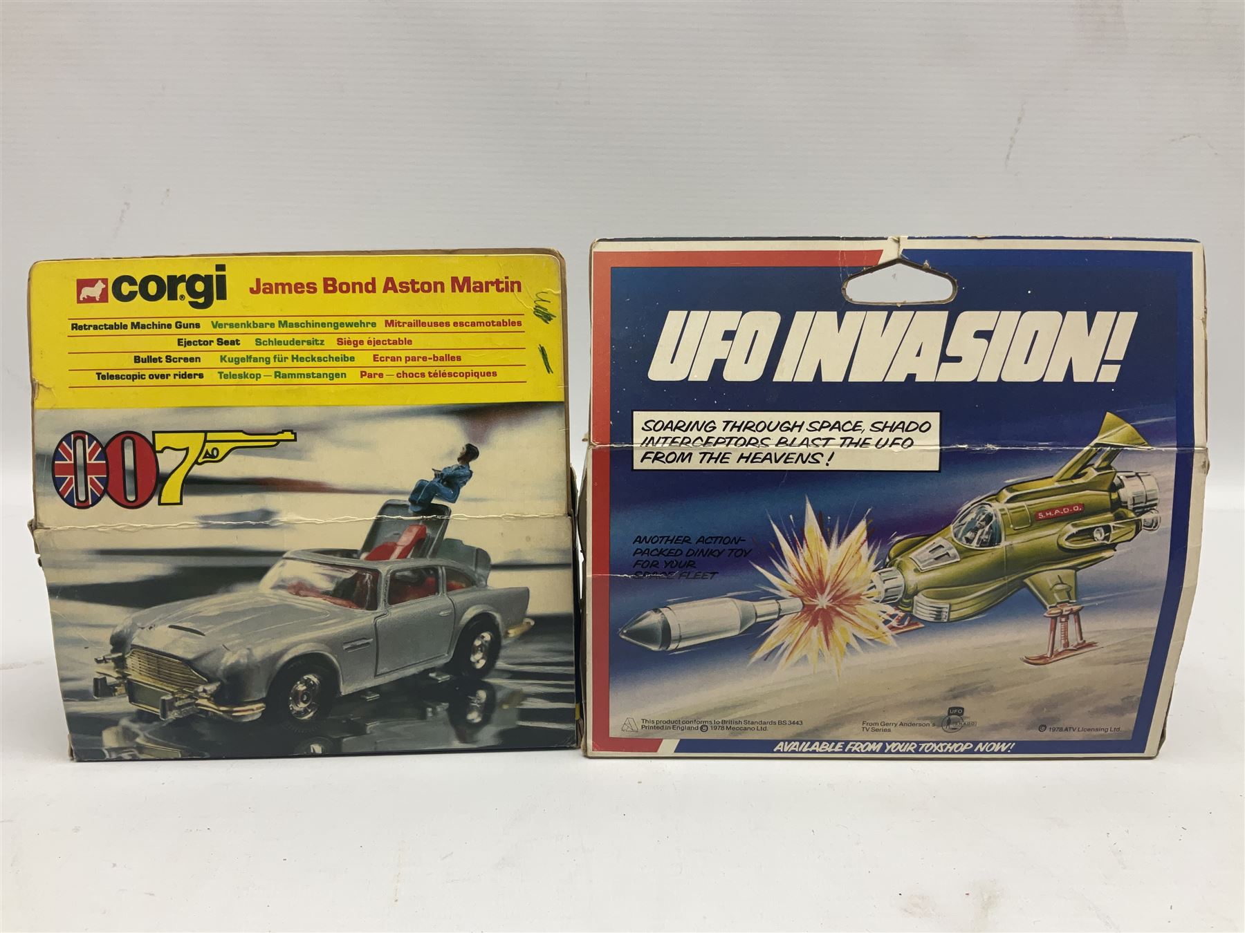 Corgi - die-cast model of James Bond Aston Martin DB5 No.271 with silver body and red interior, gold bumpers and four-spoke wheels, James Bond and two bandit figures; original window box with header card; and Dinky Shado 2 Mobile with one missile No.353; in window box (2)