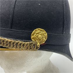 Late Victorian North Staffordshire Regiment Officer's Home Service Blue Cloth Helmet, having incorrect other ranks gilt metal Queen's crown helmet plate to the front with later leather backing, removable spike to the top on a shaped cruciform base with rosette fittings, rosette side bosses, brass trim to the front peak, and leather and velvet backed chin scales, with leather sweat band, the interior with makers stamp for Hawkes & Co 14 Piccadilly London