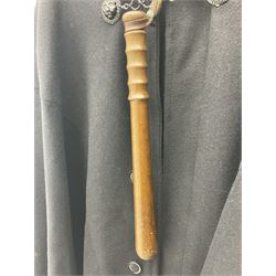 Police Constabulary style uniform items comprising woollen night cape / cloak with chain fastening, helmet and truncheon
