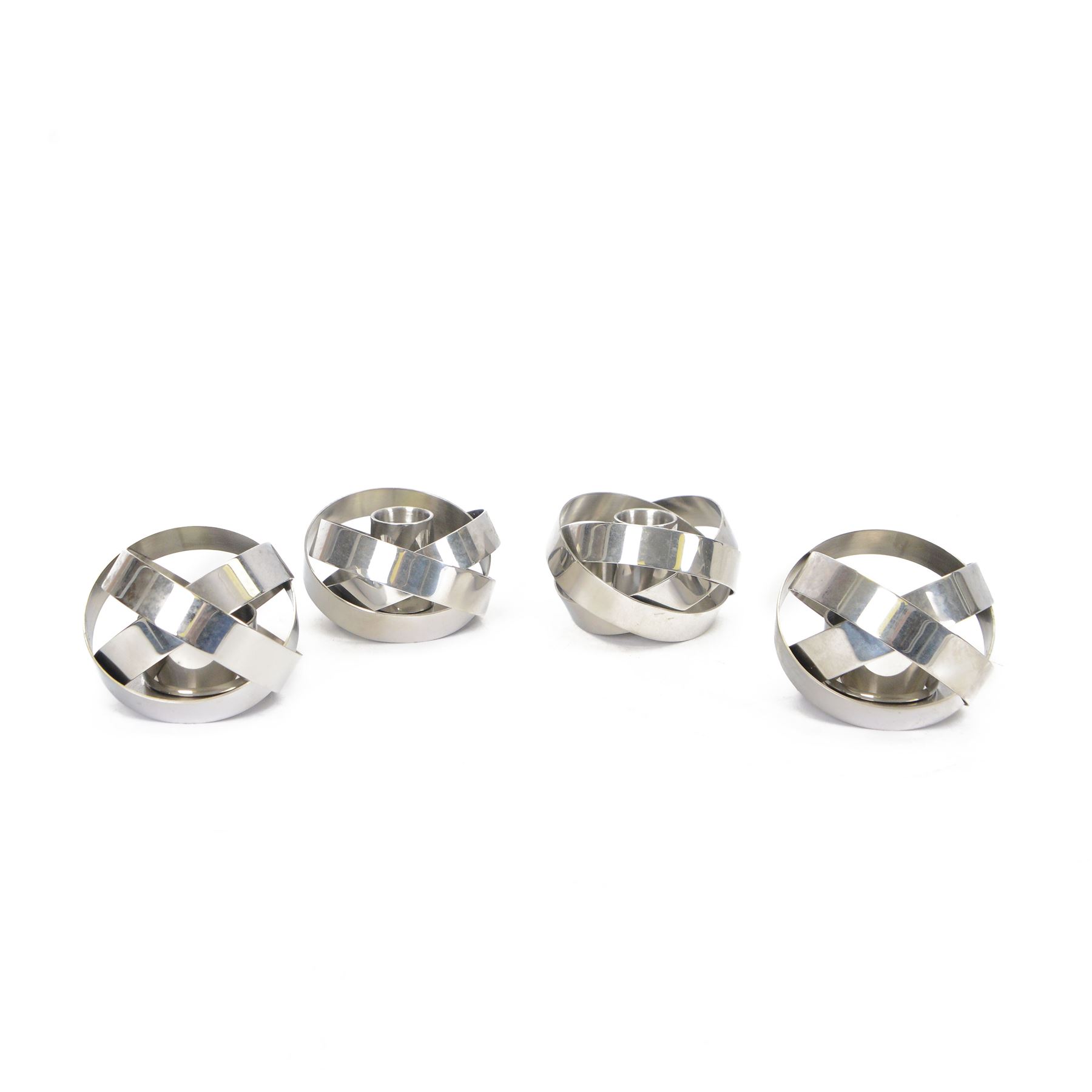 Pair of Georg Jensen stainless steel candleholders and matching pair of tealight holders, both designed by Alken & Bengtsson, with original boxes 