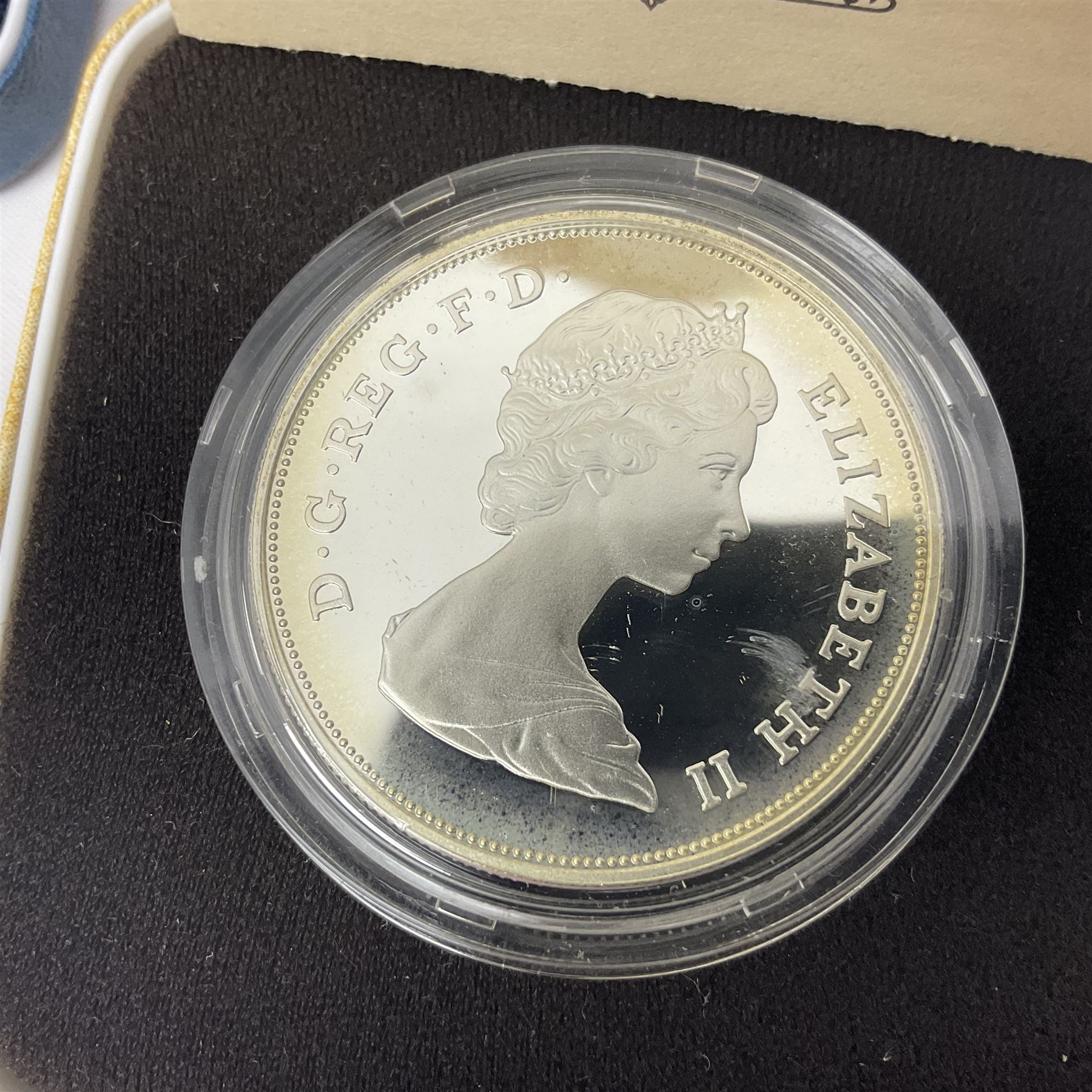 Four The Royal Mint United Kingdom silver proof coins, comprising two 1980 'Her Majesty Queen Elizabeth The Queen Mother' crowns, 1981 'Commemorating The Marriage Of His Royal Highness The Prince Of Wales And Lady Diana Spencer' crown and 1997'Golden Wedding Anniversary' five pounds, all cased with certificates 