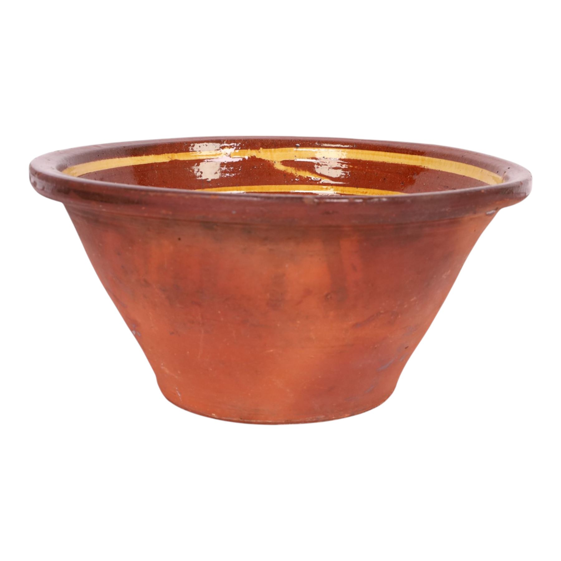 19th century terracotta bread pancheon, of circular form, the glazed interior with slip decoration, H21cm, D43cm