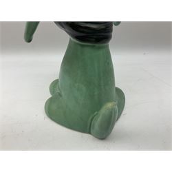 Sylvac 'toothache' dog in the green colourway, no 2451, with impressed beneath, H28.5cm