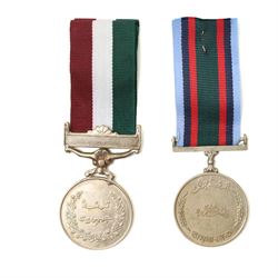 To T/14710083 Dvr S E Thompson R.A.S.C.George VI General Service medal with S E Asia clasp, two Pakistan medals, German Munchen medal, Italian paper knife in the form of a sword and other items
