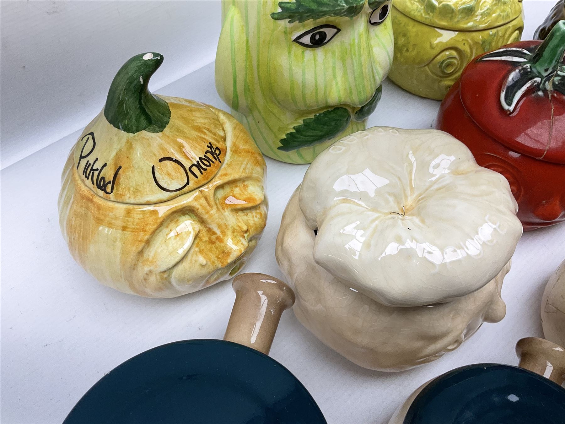 Collection of mostly Sylvac kitchen storage jar face pots, including piccalilli, chutney, tomato and bread sauce, tallest H15.5cm