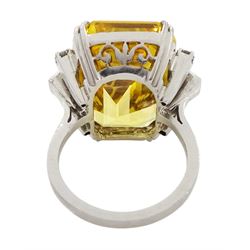 Palladium natural yellow sapphire ring, set with three baguette and round cut diamonds either side, sapphire approx 28.00 carat, with The Gem & Pearl Laboratory report stating no evidence of heat treatment, origin opinion Sri Lanka, colour transparent yellow