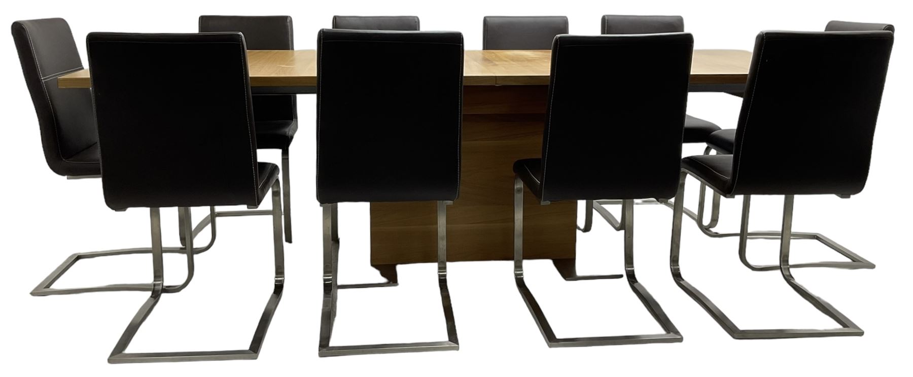 Contemporary walnut extending dining table, rectangular pull-out extending action top with two additional leaves, on rectangular base with burnished metal feet (160cm - 258cm x 100cm, H78cm); together with a set of ten cantilever dining chairs upholstered in stitched brown leather, on burnished metal supports 