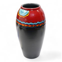 Poole Pottery Saturn Charger from the Alan Clarke 'The Planets' series, no. 1314/2000, D41cm, together with a Poole Pottery Millennium charger, no. 1035, and vase no. 1314, H34cm (3)