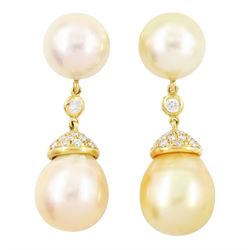 Pair of 18ct gold South Sea cultured pearl and diamond pendant earrings, each stud set wit...
