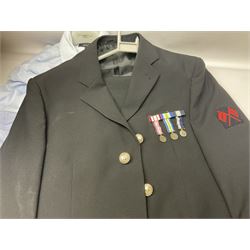Collection of vintage style clothing, including replica military style clothing, bags, shirts and jackets