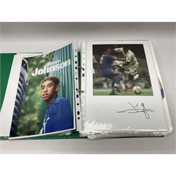 Collection of approximately 200 Leeds United related autographs, predominantly signed newspaper cuttings, contained within ring binder, together with a number of loose examples