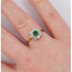 Gold emerald and round brilliant cut diamond cluster ring, stamped 18ct, total diamond weight approx 0.50 carat