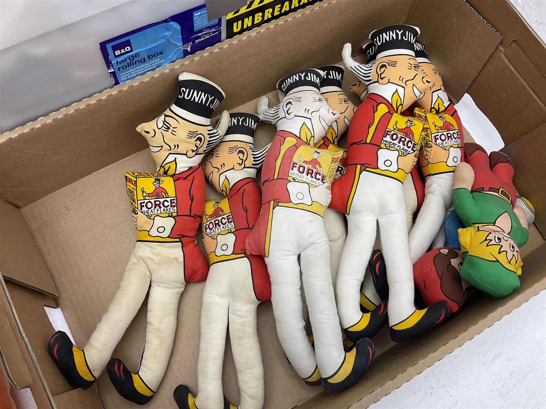 Quantity of Sunny Jim advertising soft toys, together with a quantity of Mcdonalds toys in two boxes