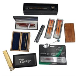 Glass calligraphy pen, boxed, together with a Parker ballpoint pen in unopened packaging, and other fountain and ballpoint pens etc