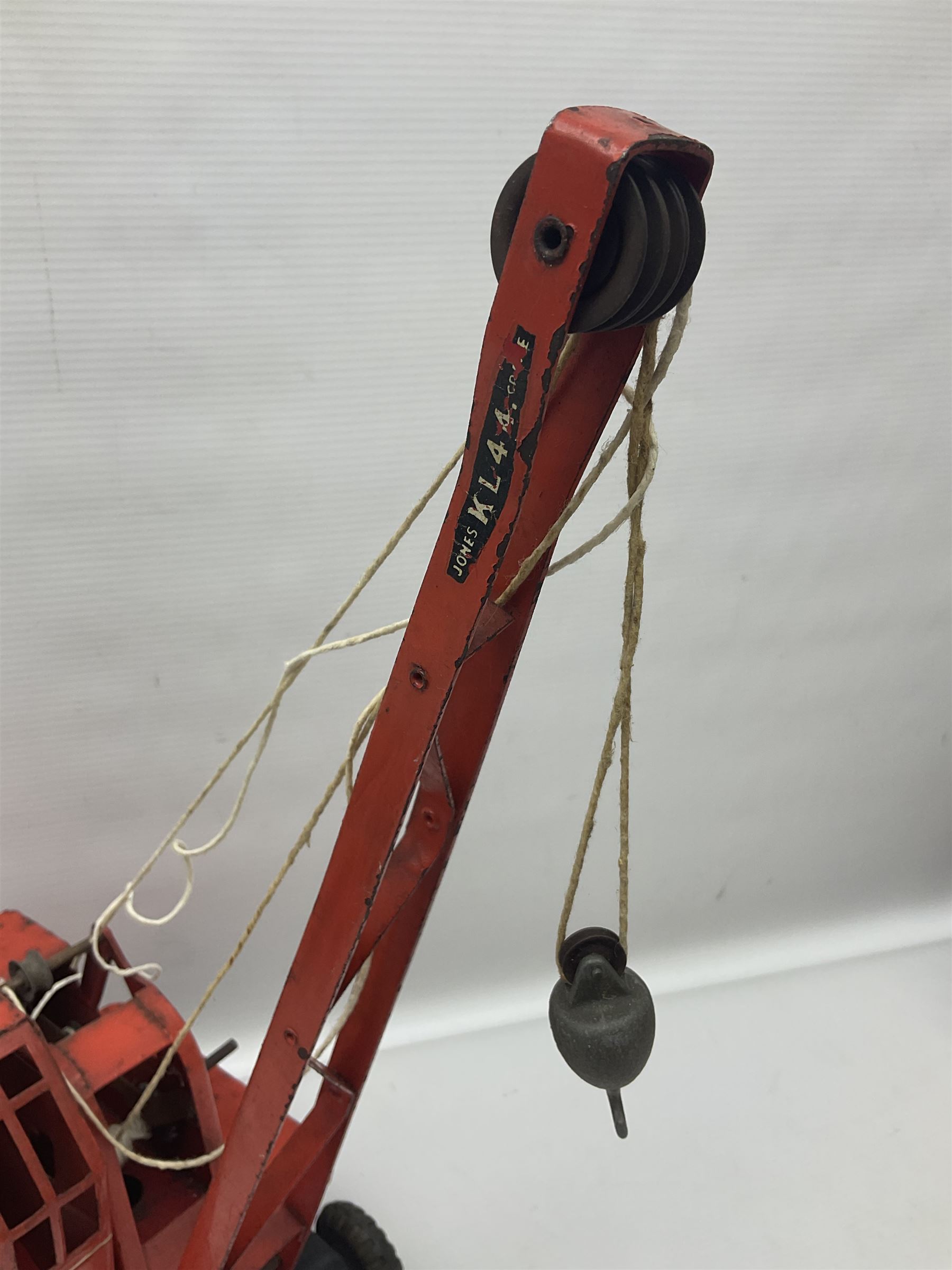 Mamod TE1a steam traction engine with burner, bunker, steering rod and funnel; red and black painted Tri-ang tin-plate Jones KL44 mobile crane; and two Hull Savings Bank Home Safe money boxes; all unboxed (4)