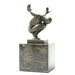 Bronze figure 'Power Of Silence', modelled as a male athlete crouched with arms outstretched, signed Milo, on black marble plinth, H15cm