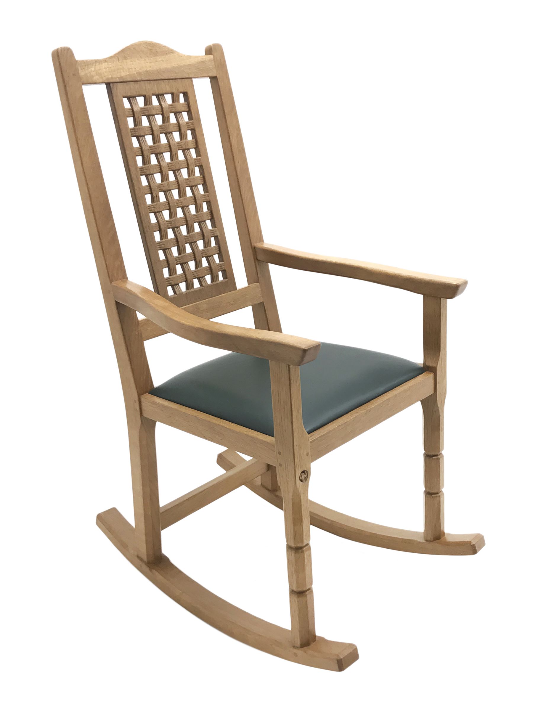 'Foxman' oak rocking chair, arched cresting rail over carved and pierced lattice splat, by Malcolm Pipes of Carlton Husthwaite, Thirsk, W55cm, H108cm, D76cm