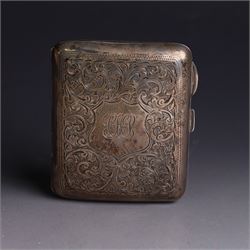 1920s silver cigarette case, with engraved initials and foliate decoration to cover and personal engraving to interior, hallmarked Smith & Bartlam, Birmingham 1924, with a similar silver vesta case, hallmarked, cigarette case H8.5cm