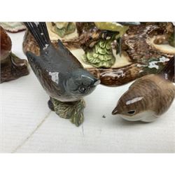 Nine Beswick bird figures, with stand, together with USSR thrush, two Franklin Mint Jane Austin figures and four Royal Doulton figures 