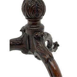 In the manner of Thomas Chippendale - mahogany tripod wine table, moulded pie crust border top on fluted stem with acanthus leaf carved baluster, three splayed acanthus carved supports in the form of c-scrolls, terminating at scroll carved feet with blocks, foliate carvings to knees 